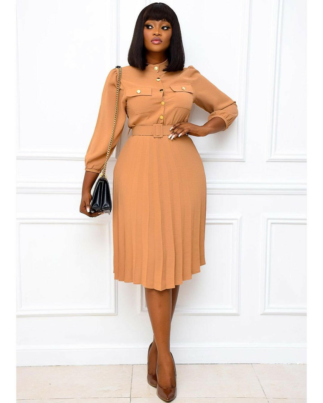 Solid color mid-length dress.