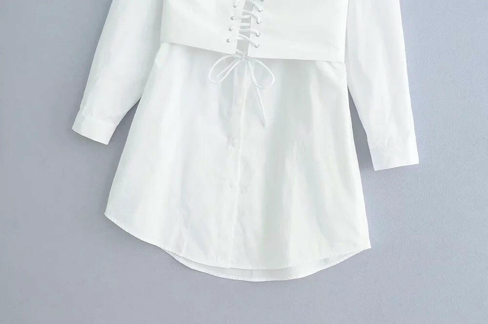 Long sleeve white shirt dress with tie waist.