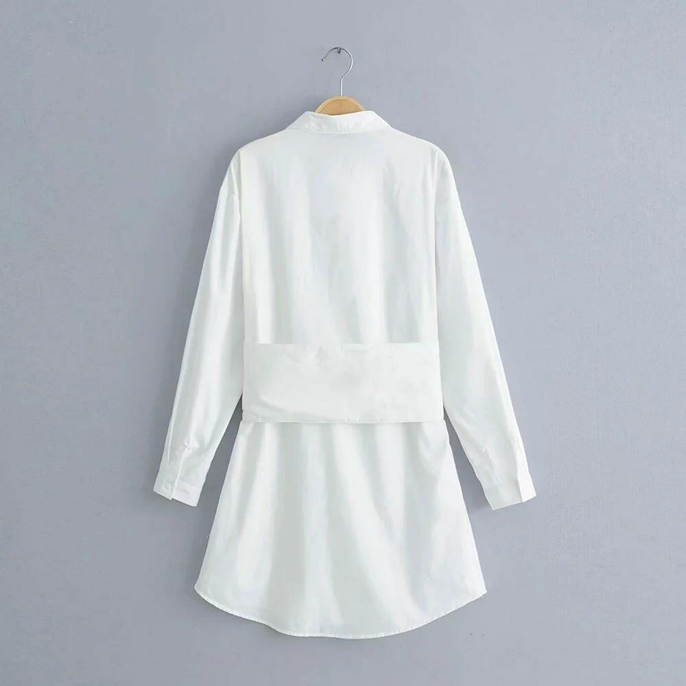 Long sleeve white shirt dress with tie waist.